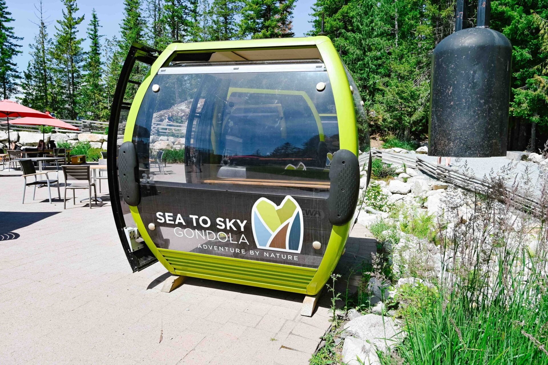 gondola cars that sit on the ground and are now cafe tables
