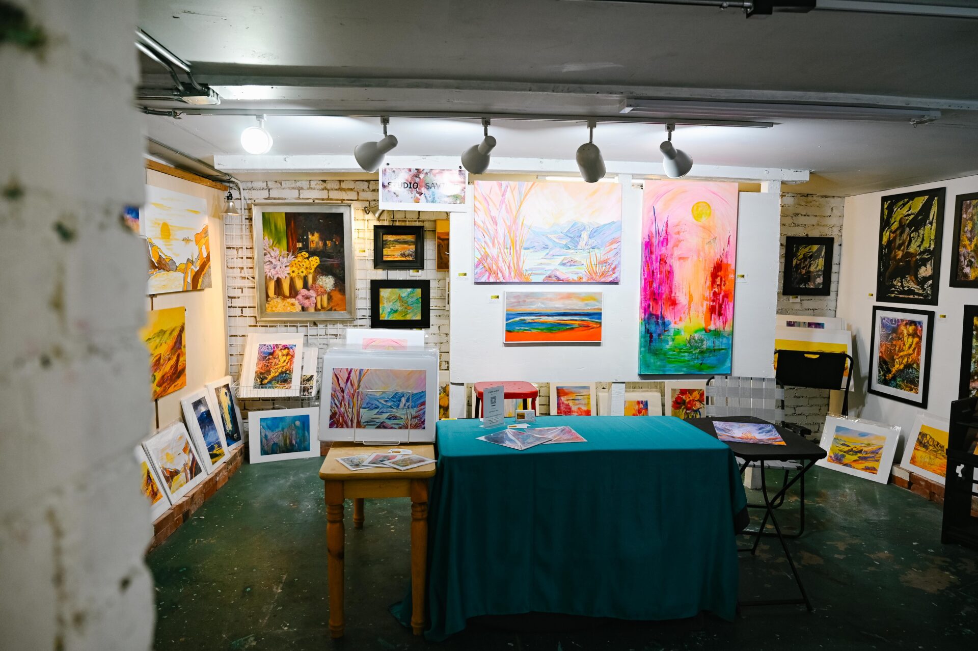 bright and colourful watercolour paintings and nature paintings hanging on the wall