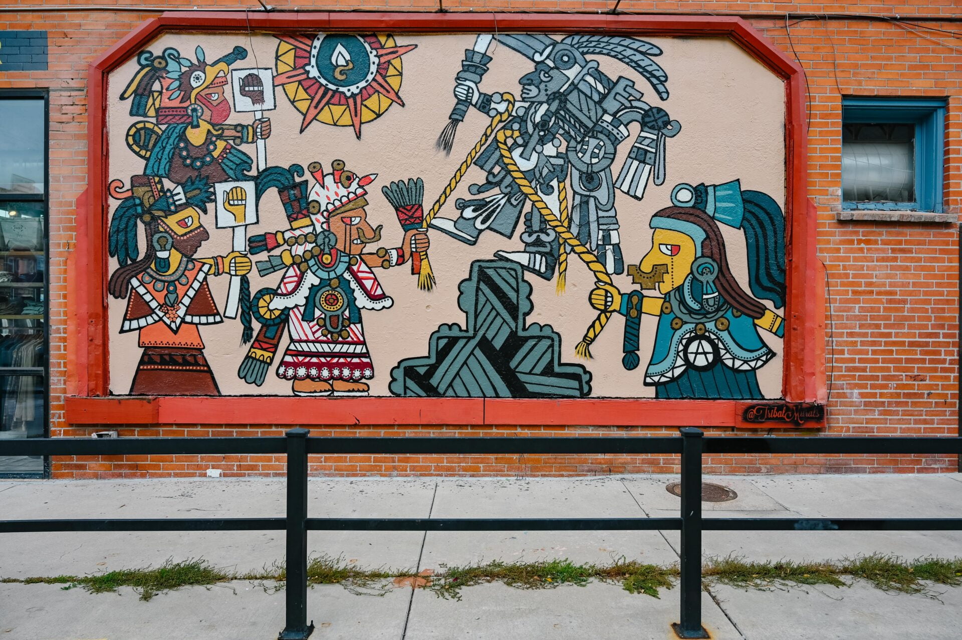 a tribal themed mural found in denver