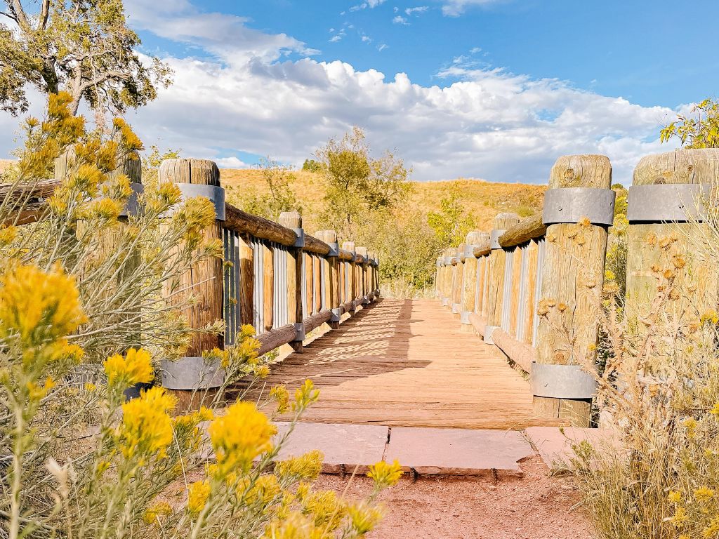 wooden bridge on one of the trails at red rocks amphitheater