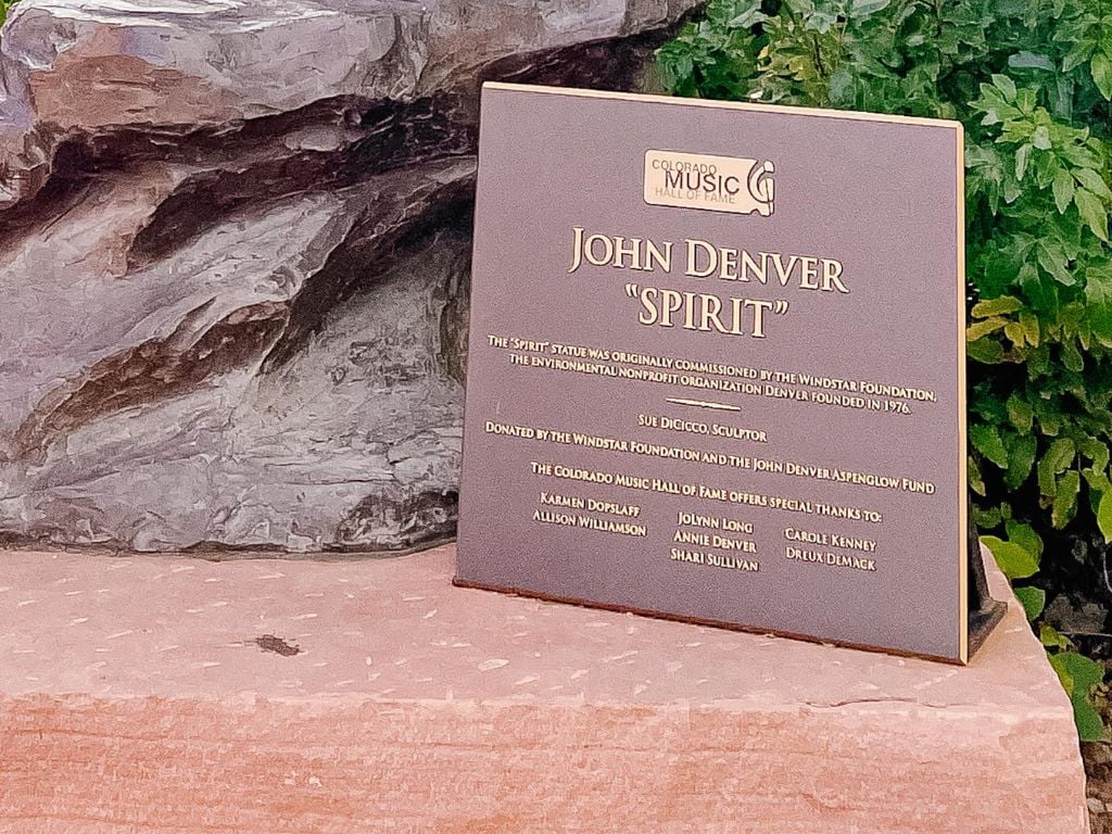 close up of john denver plaque at the colorado music hall of fame inside red rocks park