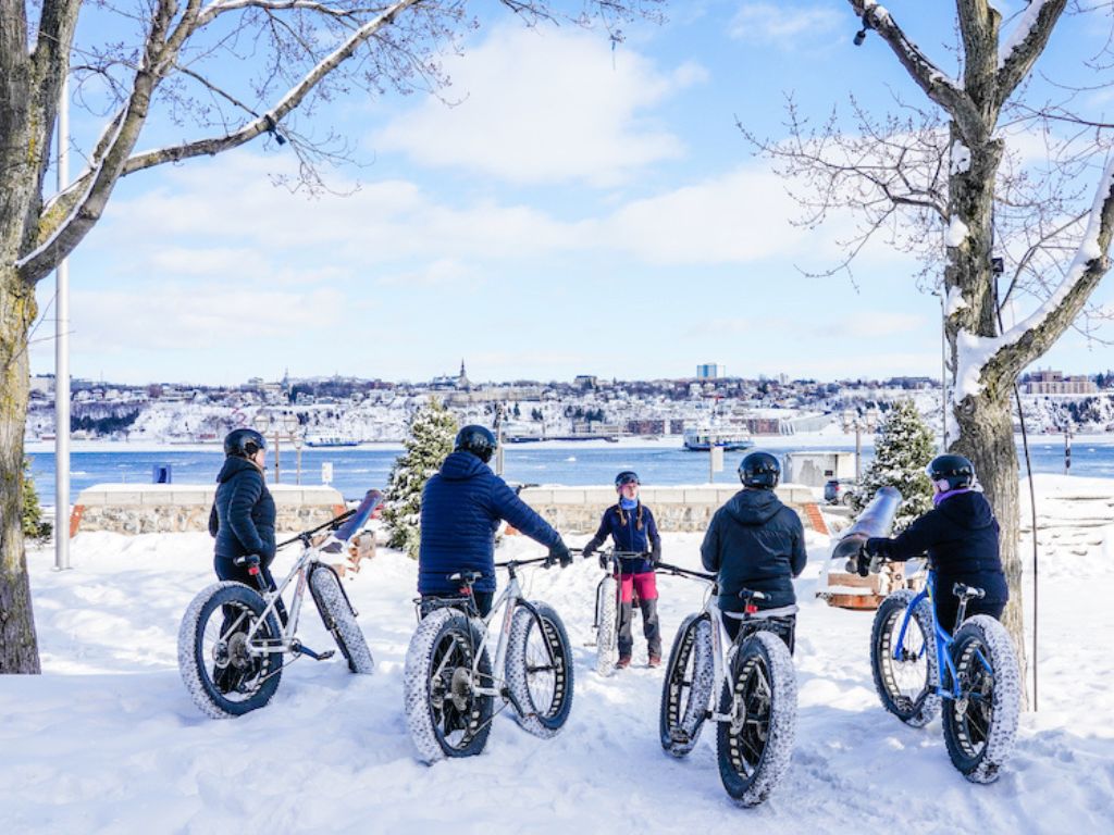 a guided Quebec city bike tour stops to listen to their guide