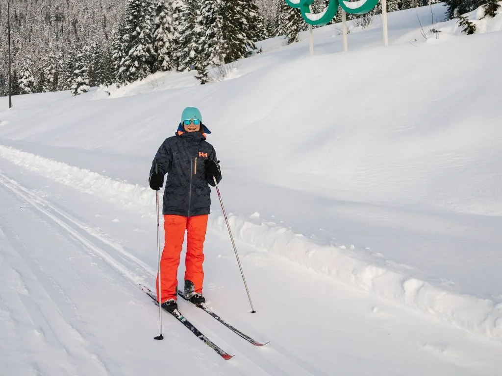 a woman nordic skiing at the whistler olympic park