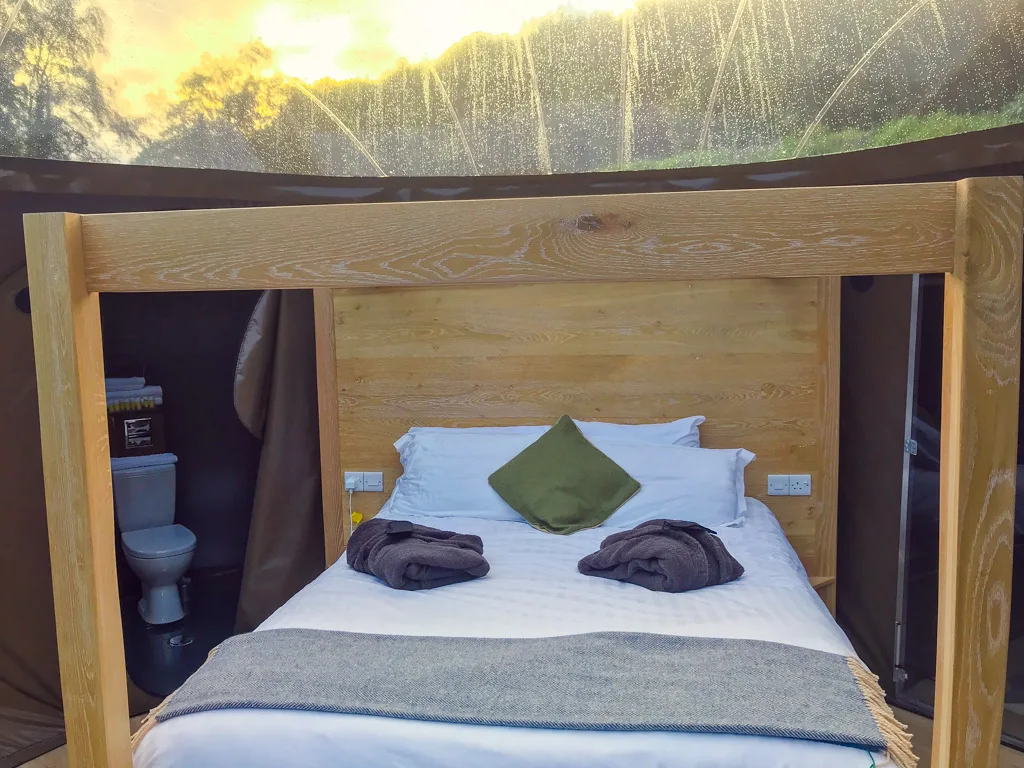 king size bed inside a Finn Lough bubble dome