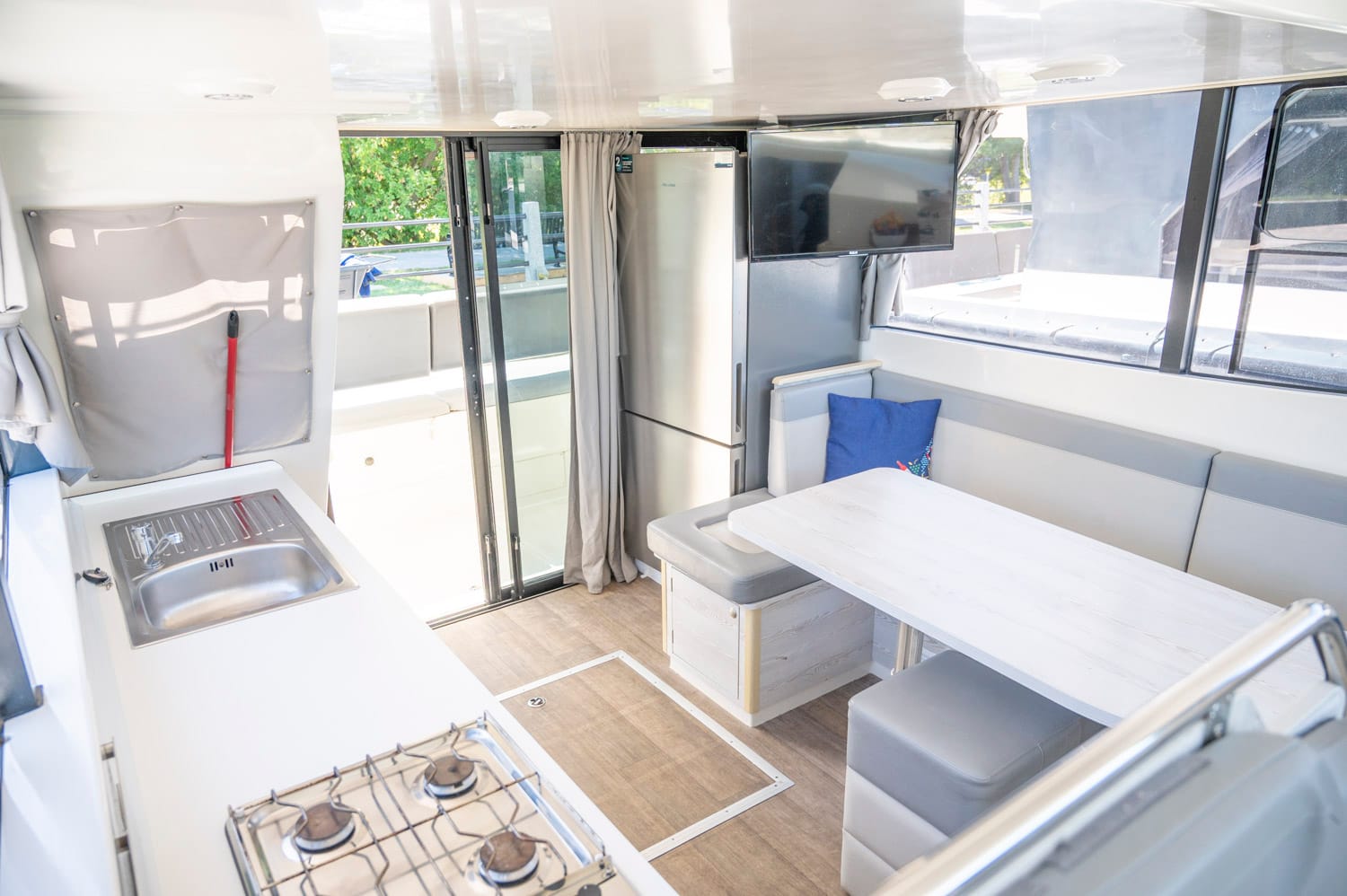 inside kitchen and dining area of a le boat