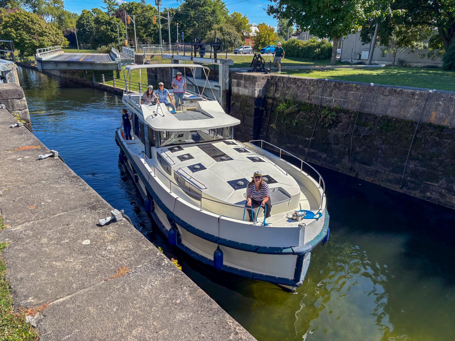 le boat houseboat entering a lock on the rideau canal in ontario