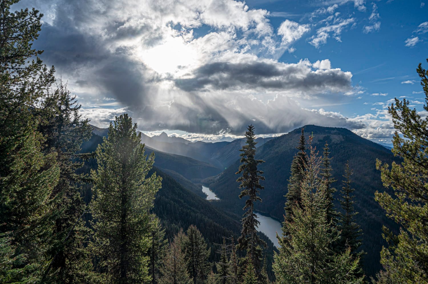 looking down at lightning lakes from a lookout point on the frosty mountain hike