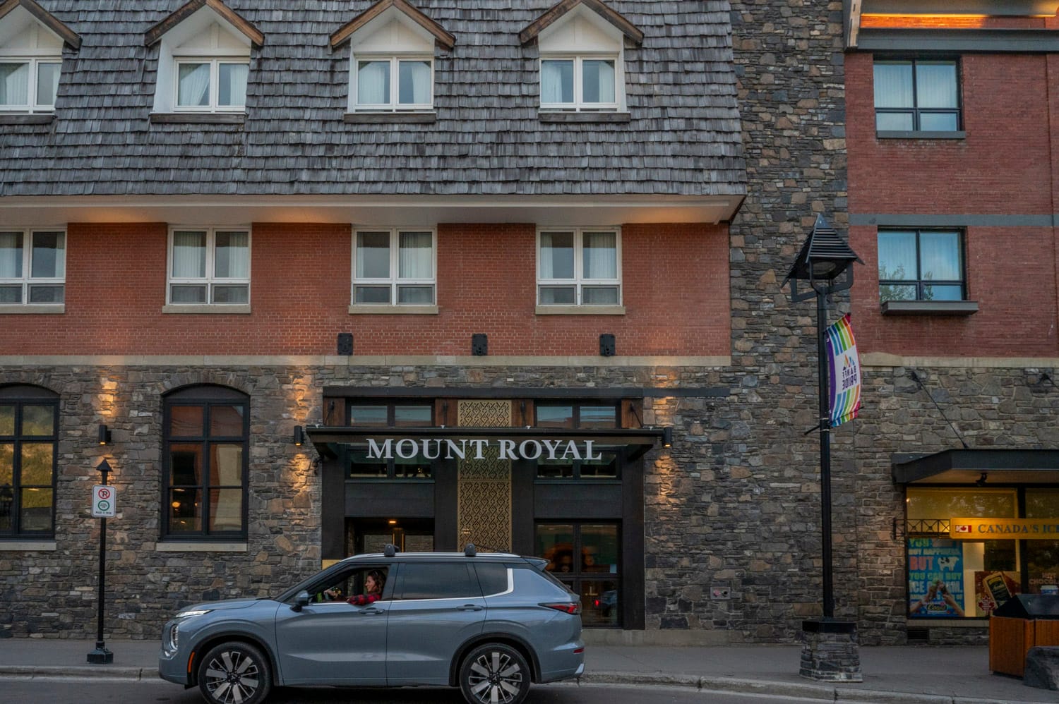 car parked out the front of the mount royal hotel in banff