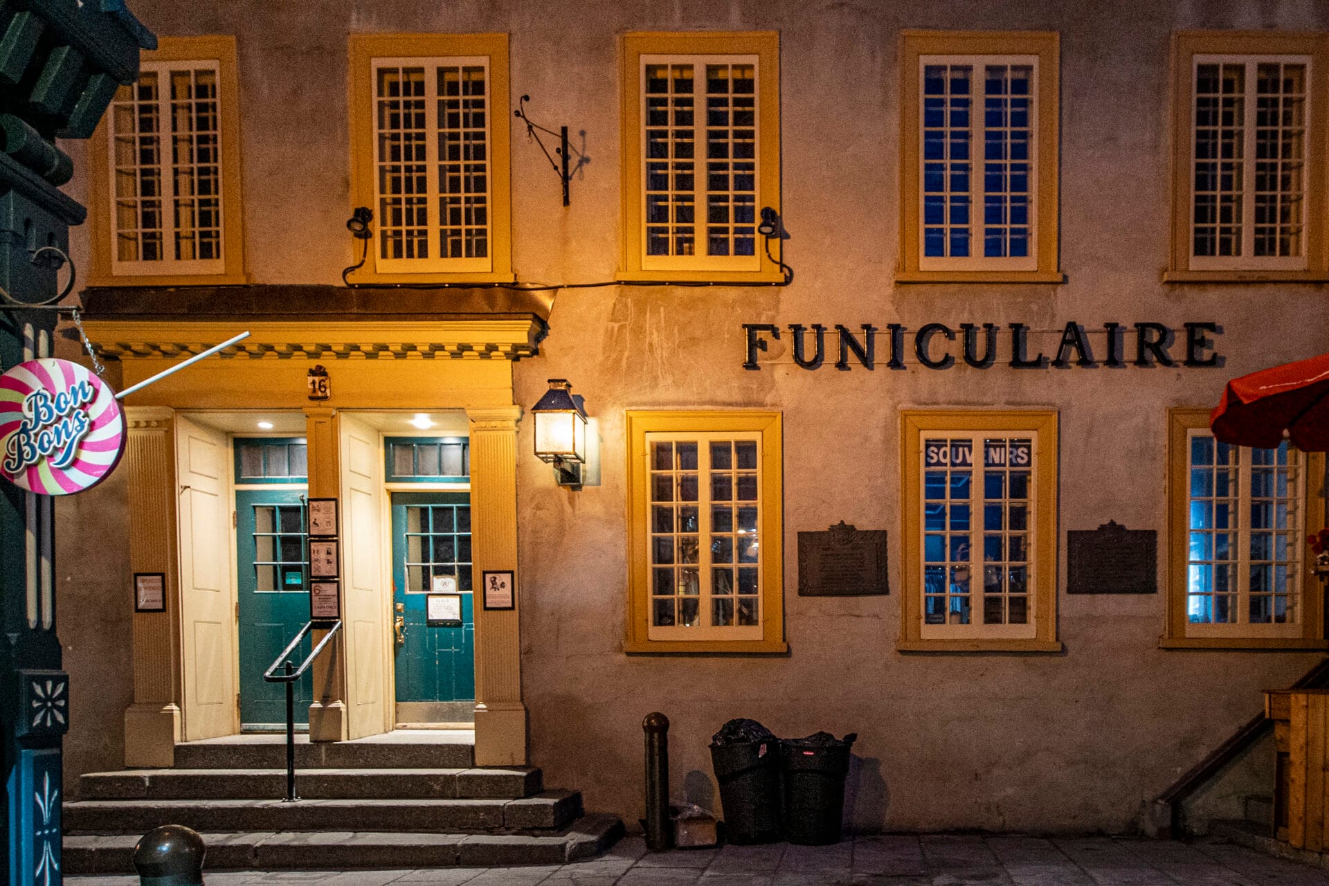 outside of the quebec city funiculaire building at night