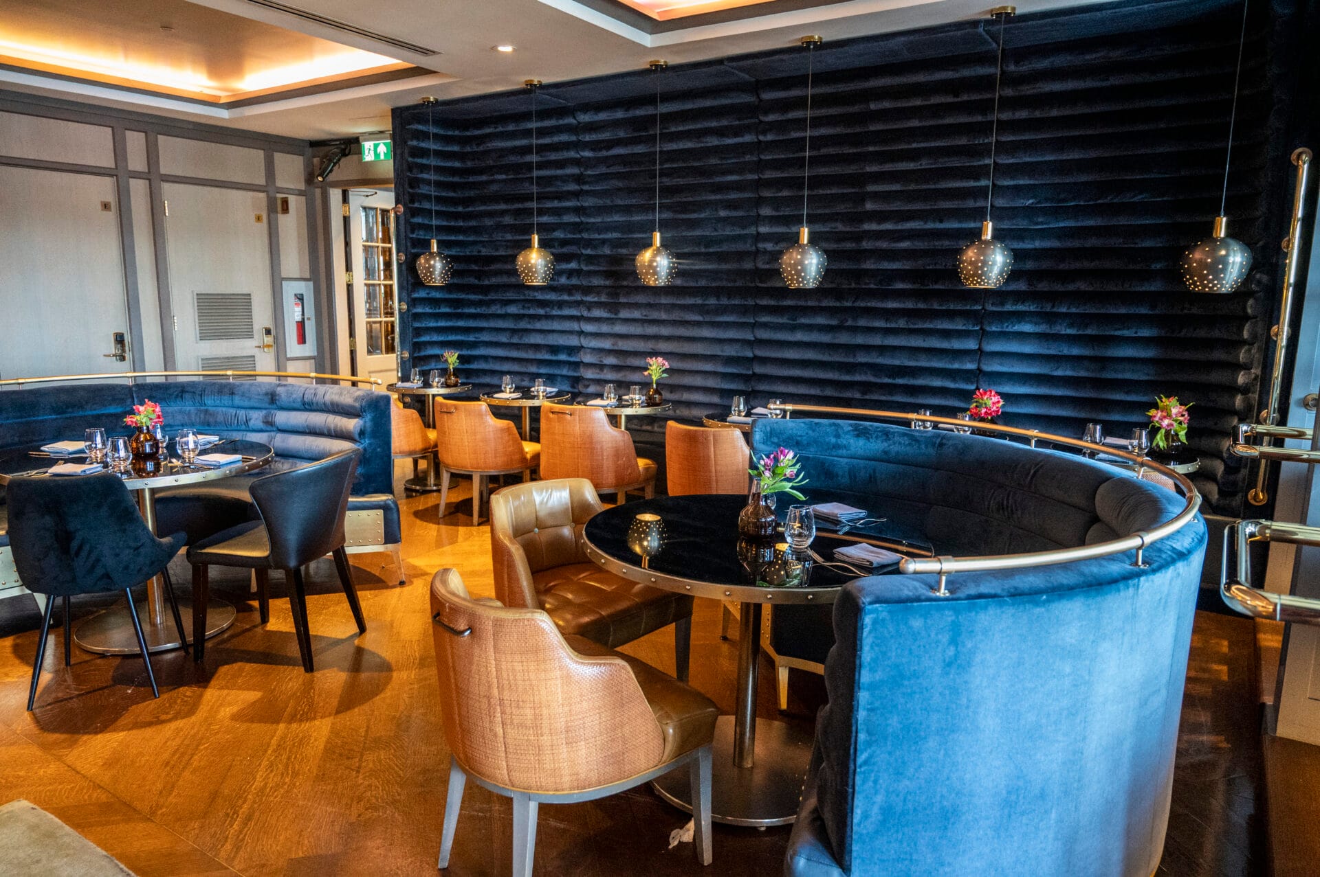 seating area of Bistro Le Sam inside the Fairmont Le Château Frontenac hotel in quebec city