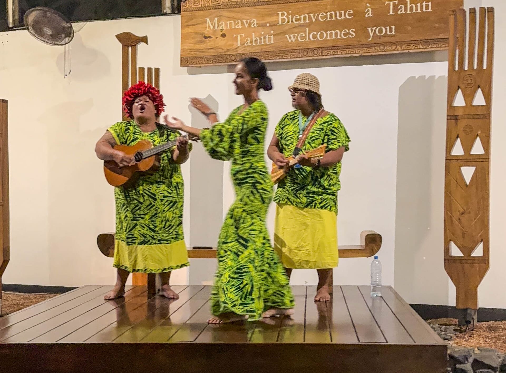 welcome Air Tahiti Nui crew singing, dancing, and playing ukulele