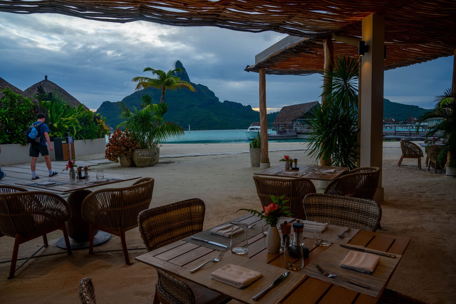 open-air restaurant at Westin Bora Bora overlooking a beach, turquoise water, and Mount Otemanu