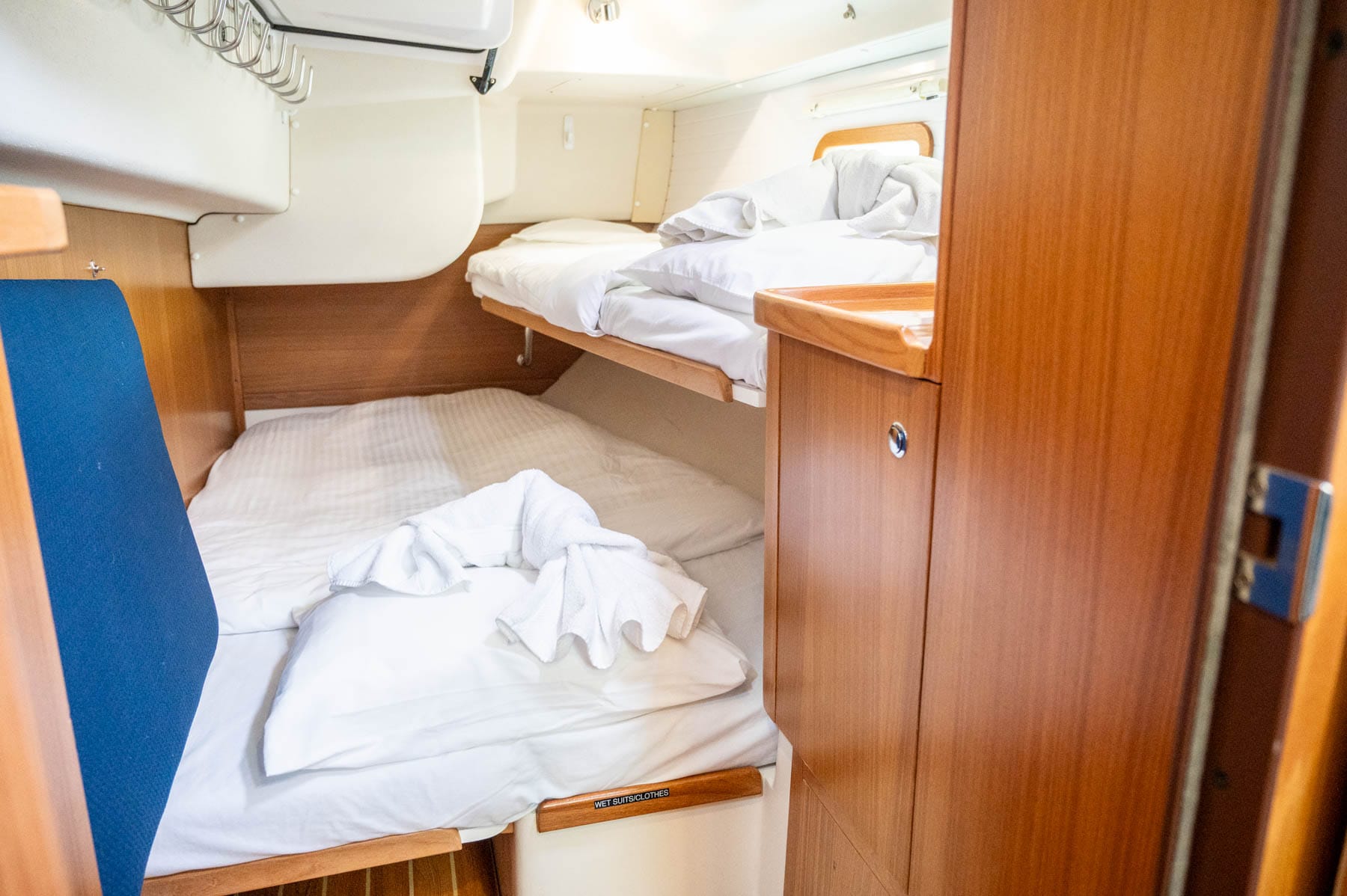 Simply Dreaming aft stateroom with a double bed and a single bunk on top