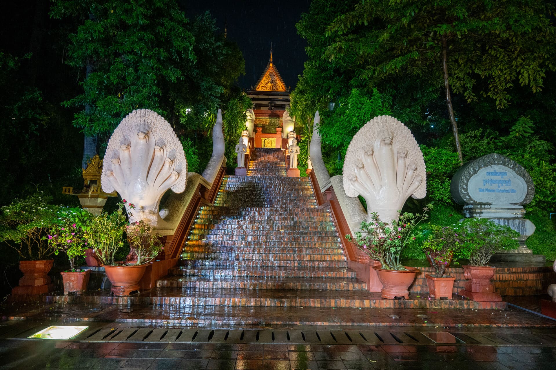 illuminated grand eastern staircase of Wat Phnom
